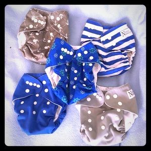 Set of 6- Nora’s Nursery cloth diapers + bag!